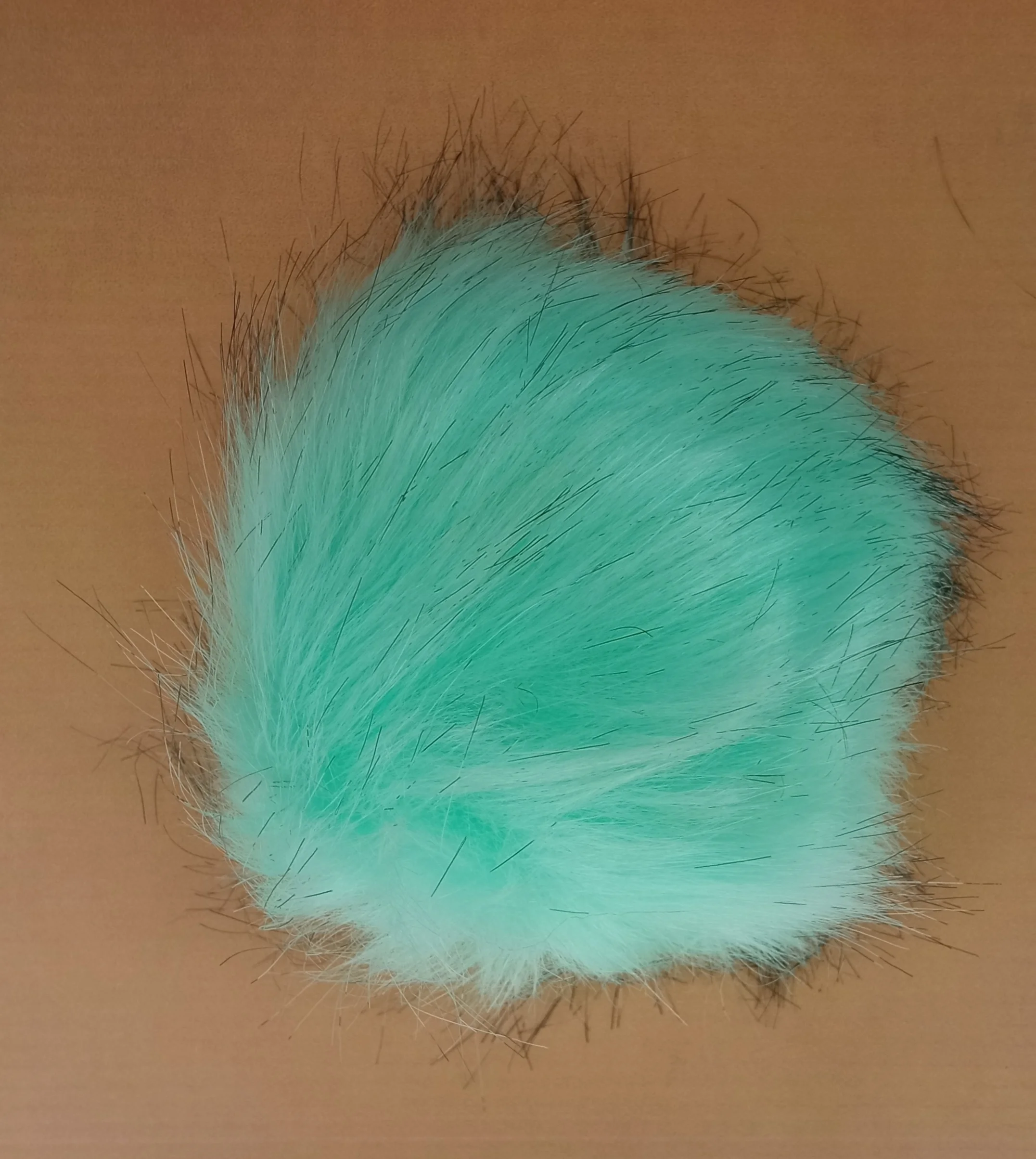 Pompón Sintético PS5 (verde con puntas negras)