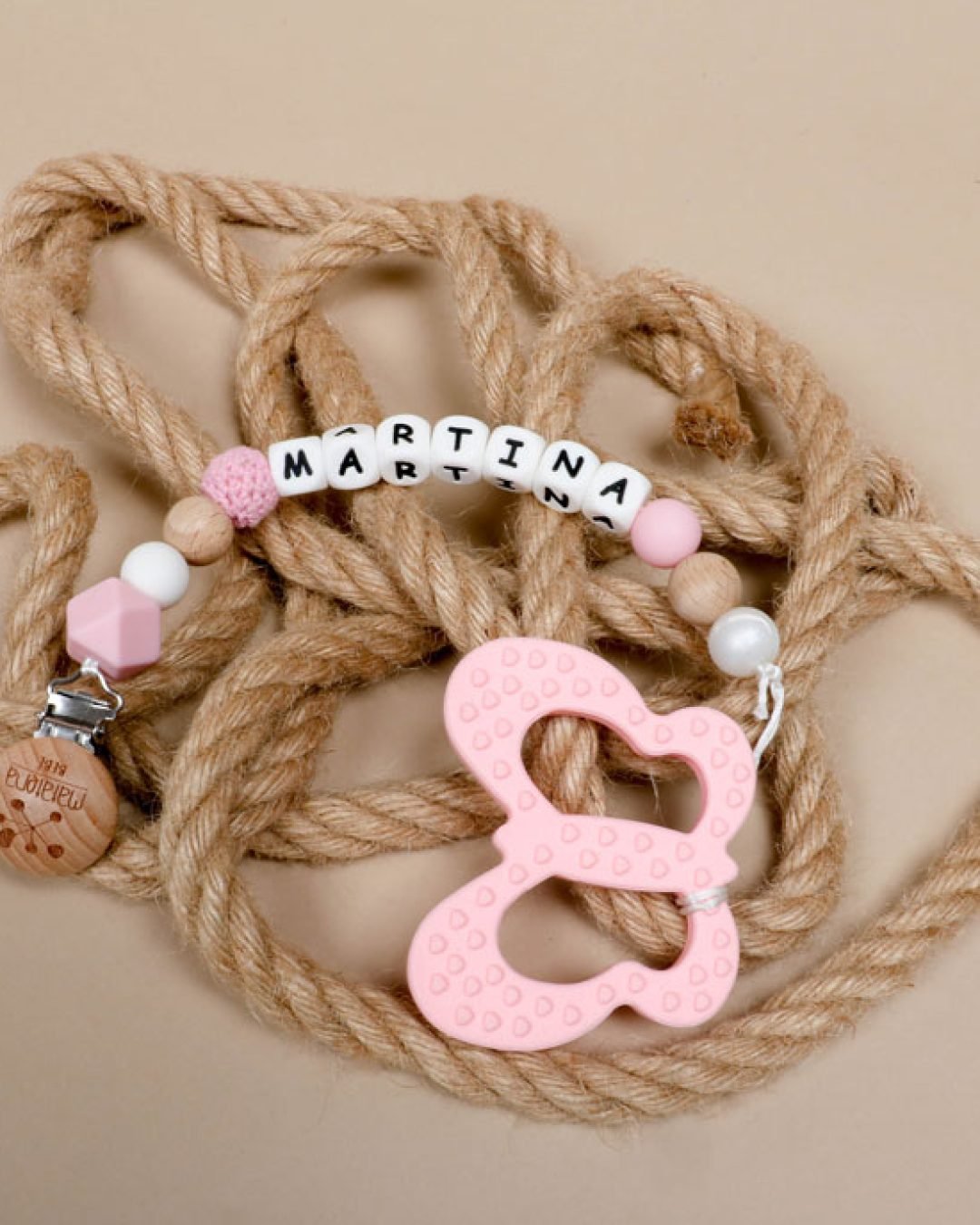 mordedera-mariposa-rosa-matatenabebe